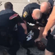 Illustration for article titled Video Shows Former NFL Player Being Tackled And Choked By Police Over Parking Lot Argument